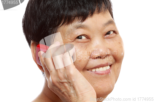 Image of Senior Woman Talking On Mobile Phone