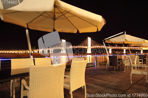 Image of Street cafe at night 