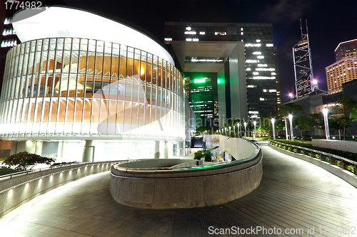 Image of modern office building in downtown city at night