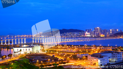 Image of Cityscape in night with famous travel tower near river in Macao,