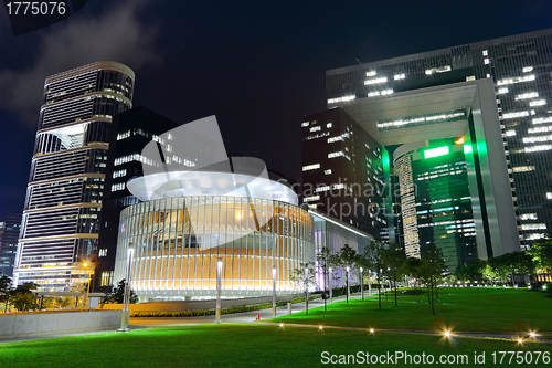 Image of modern office building in downtown city at night