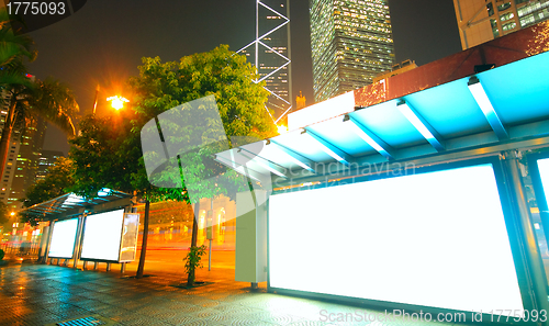 Image of Blank billboard on bus stop at night 