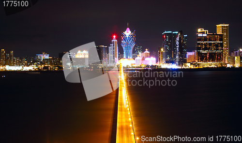 Image of Macao cityscape with famous landmark of casino skyscraper and br