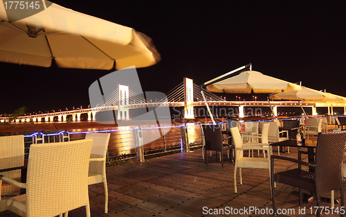 Image of Street cafe at night 