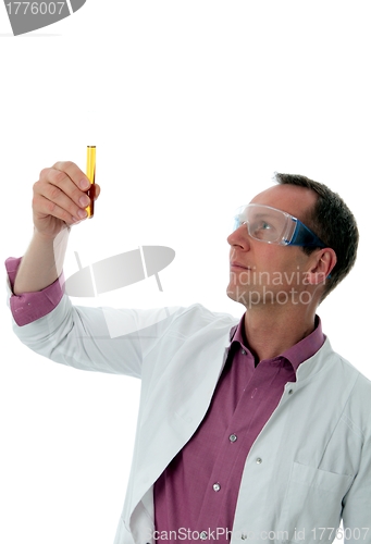 Image of chemist looking on test glass