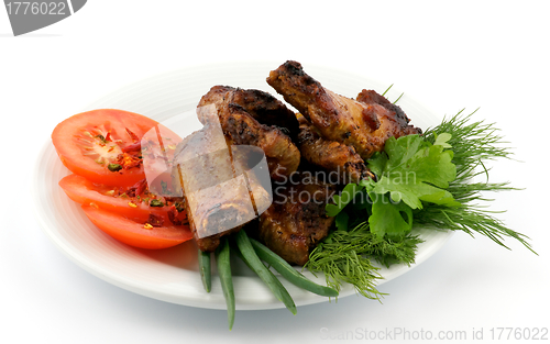 Image of Barbecued pork ribs on white plate