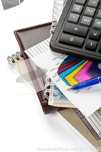 Image of Arrangement of office supply, calculator and blocks