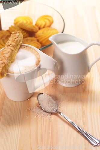 Image of fresh breakfast coffee and pastry