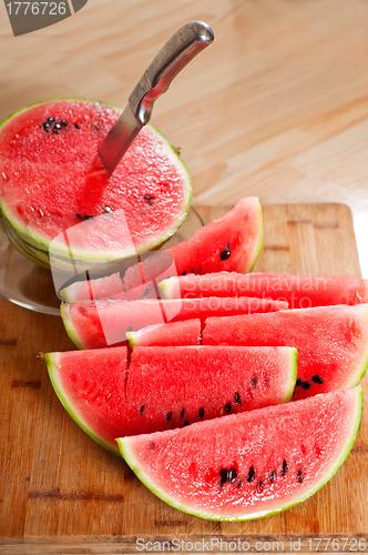 Image of fresh watermelon on a  wood table