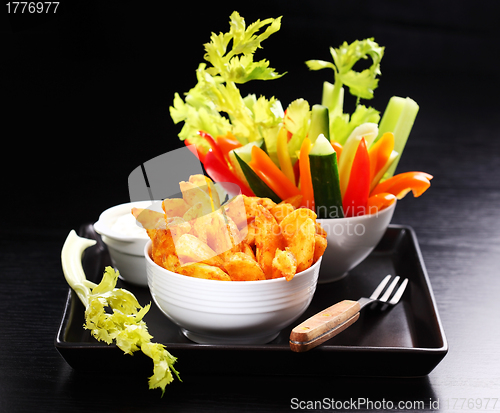 Image of Wedges with raw vegetable and dip