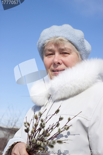 Image of Woman on stroll In spring day