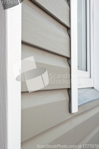 Image of Wall is covered by vinyl siding