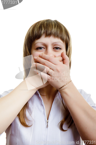 Image of young girl covers her mouth with his hands