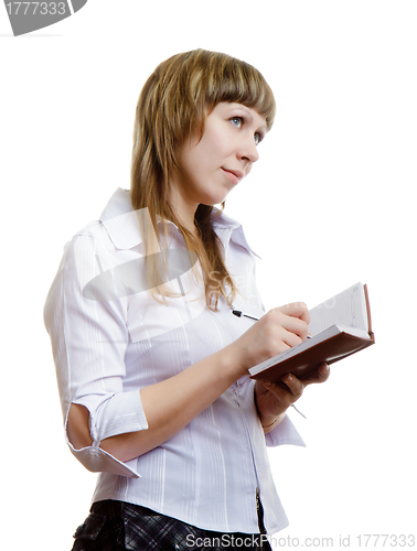 Image of young girl with a notebook