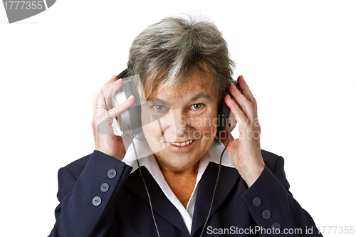 Image of Female senior with headphone