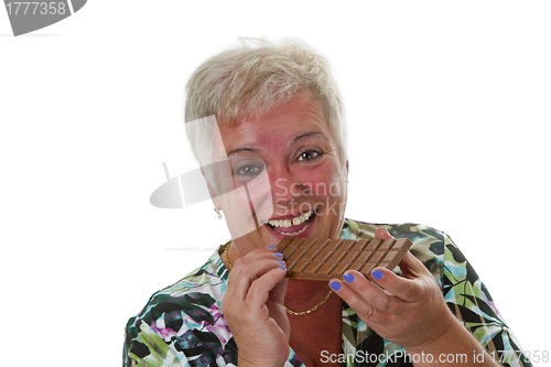 Image of Female senior with bar of chocolate