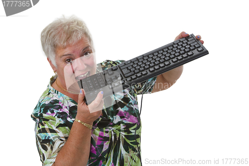 Image of Female senior having problem with computer