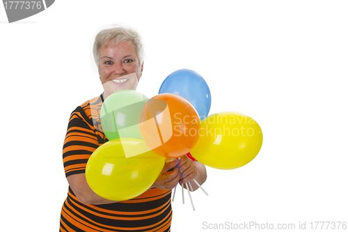 Image of Female senior with colorful ballons 