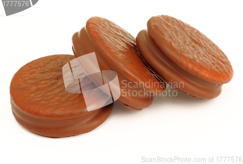 Image of Stack of three chocolate cream  cookies 