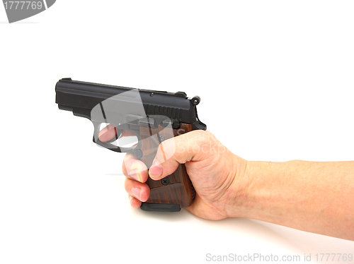 Image of Hand with gun isolated