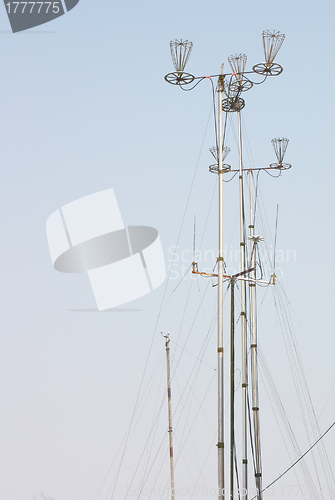Image of Telecommunication tower with rich blue sky