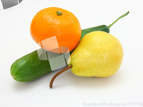 Image of cucumber with a tangerine and a pear 