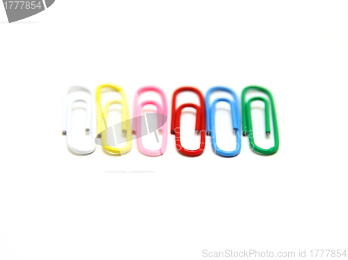 Image of Color paper clips to background.