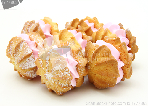 Image of Yellow cookies with a  stuffing  on a white background 