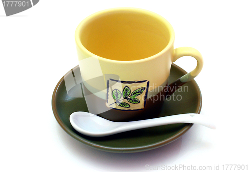 Image of Ceramic cup on a saucer