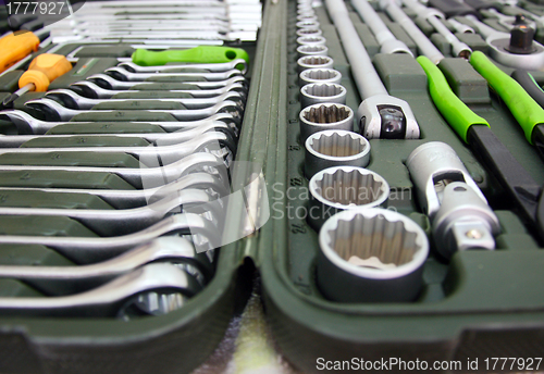 Image of set of tools for home and car in a box