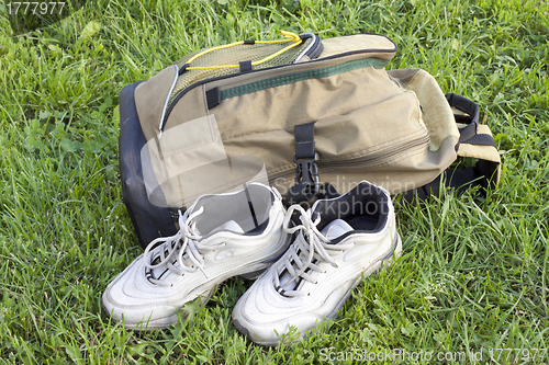 Image of Backpack and sneakers tourists