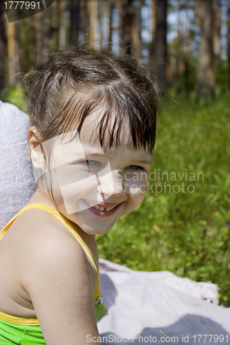 Image of Baby girl wet after swimming