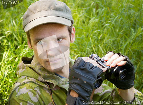 Image of The young man conducts observation