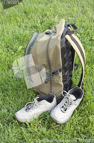 Image of Backpack and sneakers tourists