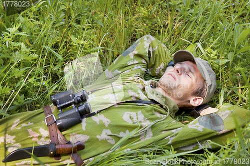 Image of A man dressed in camouflage