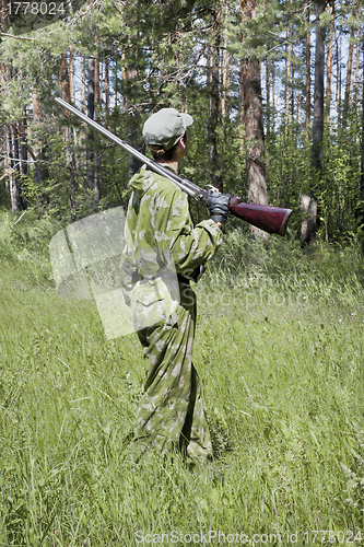 Image of The shooter in camouflage