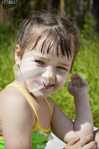 Image of Baby girl wet after swimming