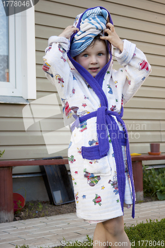 Image of The little girl after water procedures