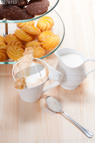 Image of fresh breakfast coffee and pastry