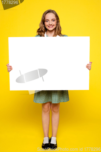 Image of Teenager showing white blank billboard