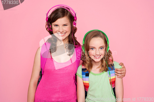 Image of Sisters standing together and enjoying music