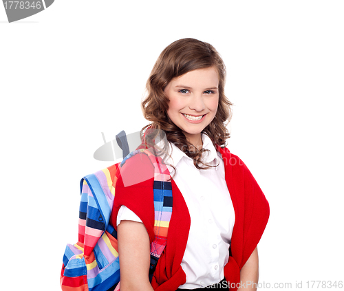 Image of Smiling teenager student with colorful bag