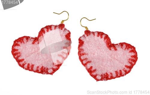 Image of earrings in the form of the heart. Collage.