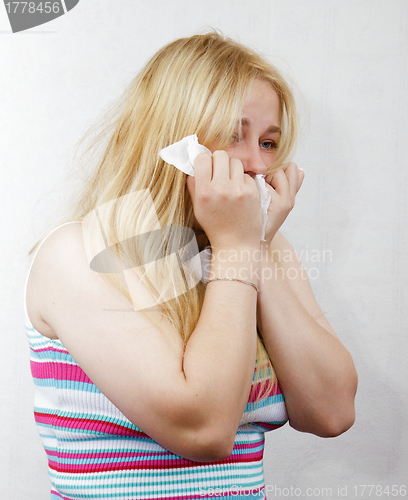 Image of cold blonde girl with the handkerchief