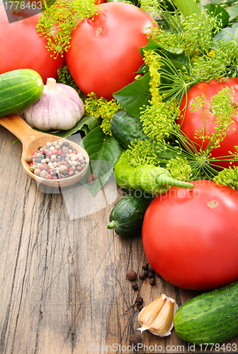 Image of Vegetables for pickling on a wooden table.