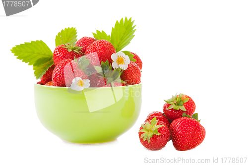 Image of green bowl with fresh strawberry on the isolated white