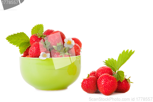 Image of green bowl with fresh strawberry on the isolated white