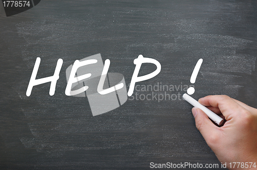 Image of Help written with chalk on a blackboard background