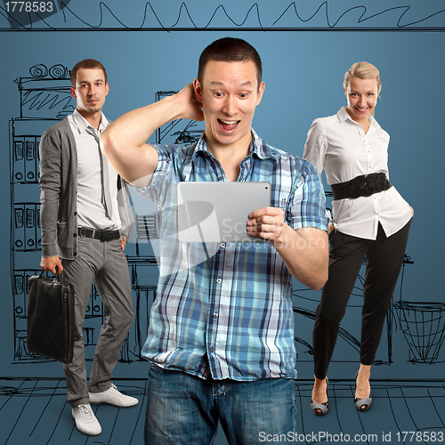 Image of Man With Touch Pad And Business Team 
