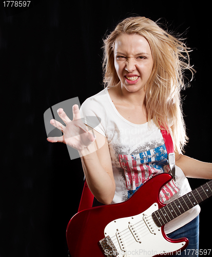 Image of Woman Playing the Guitar